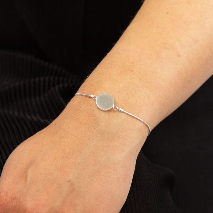 Silver Disc Toggle Bracelet on wrist